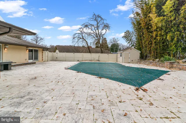 a view of a backyard of the house