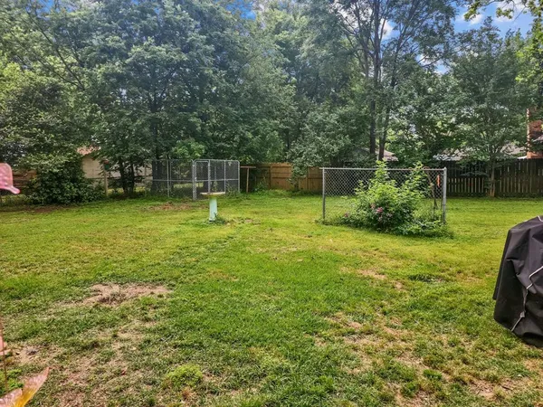 a view of a backyard with slide