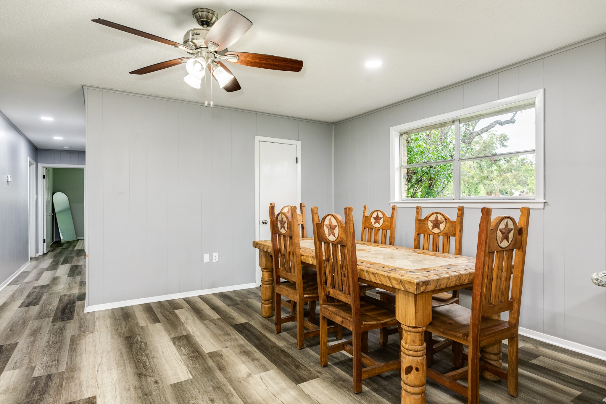 908 West Mulberry Street Angleton, TX 77515 - Photo 12 of 22 a view of a dining room with furniture window and outside view