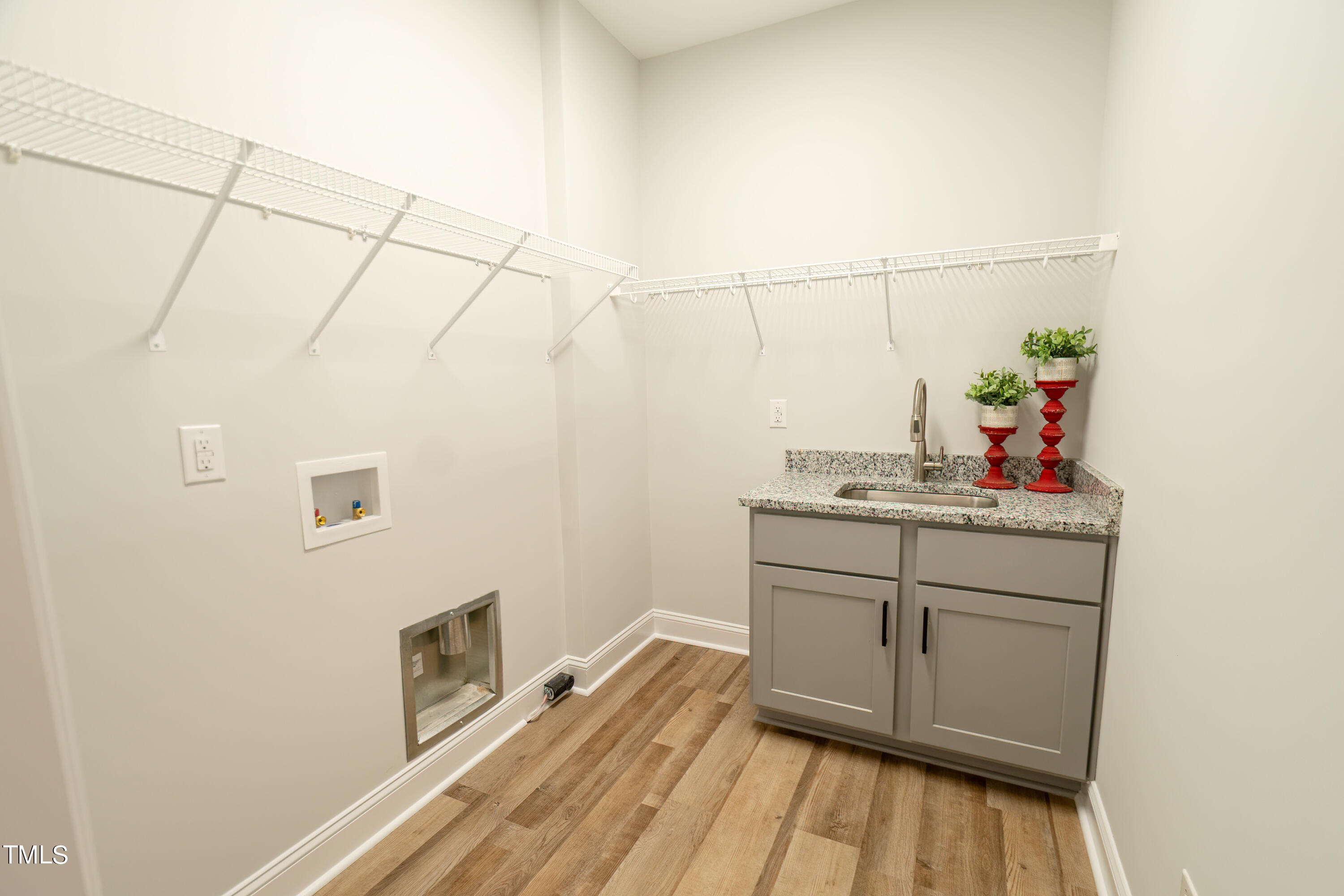 6591 Green Path Road Dunn, NC 28334 - Photo 19 of 25 a room with a sink and cabinets