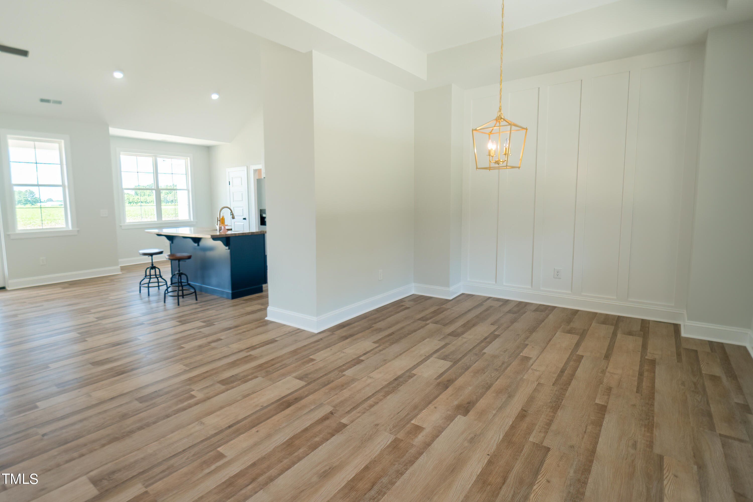 6591 Green Path Road Dunn, NC 28334 - Photo 4 of 25 a view of a room with wooden floor and furniture