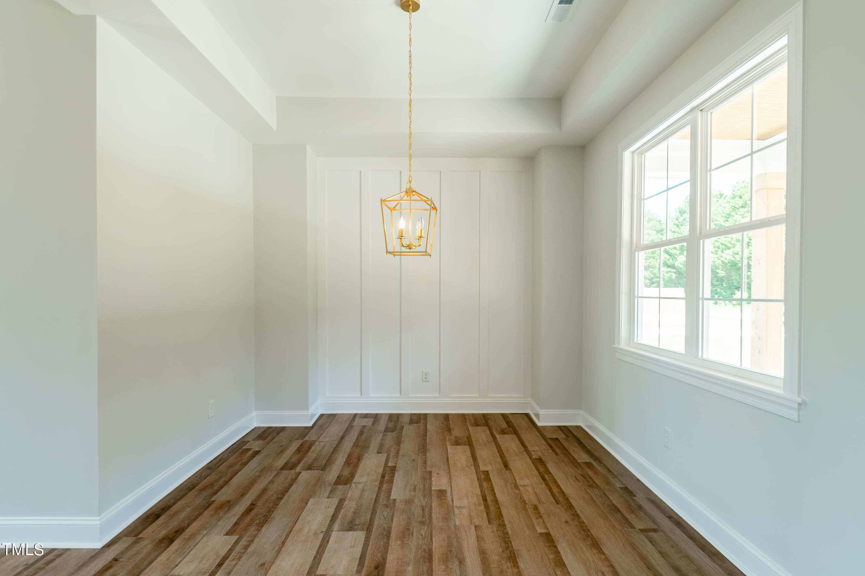 6591 Green Path Road Dunn, NC 28334 - Photo 5 of 25 a view of a room with wooden floor and window