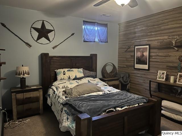 1126 East Co Road 350 Sutter, IL 62373 - Photo 15 of 23 a bed sitting in a bedroom next to a lamp