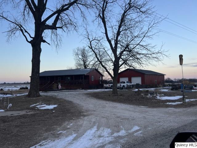 1126 East Co Road 350 Sutter, IL 62373 - Photo 22 of 23 a large tree in front of a house