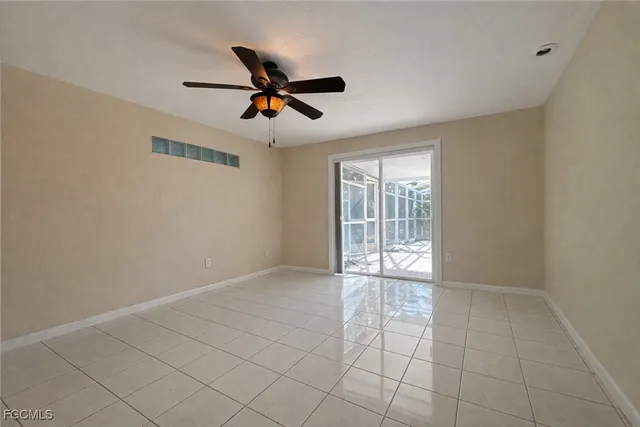 a view of an empty room and window