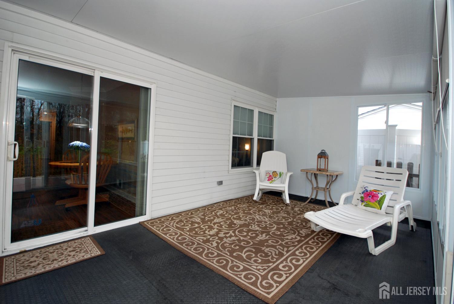 26 Sunshine Lane Edison, NJ 08820 - Photo 28 of 33 a living room with furniture and a window