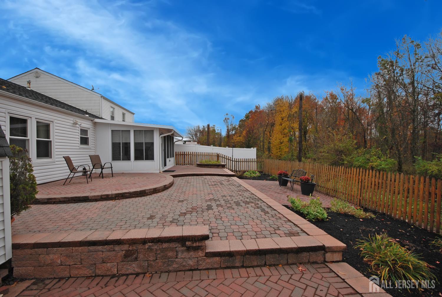 26 Sunshine Lane Edison, NJ 08820 - Photo 31 of 33 a view of a house with backyard and sitting area