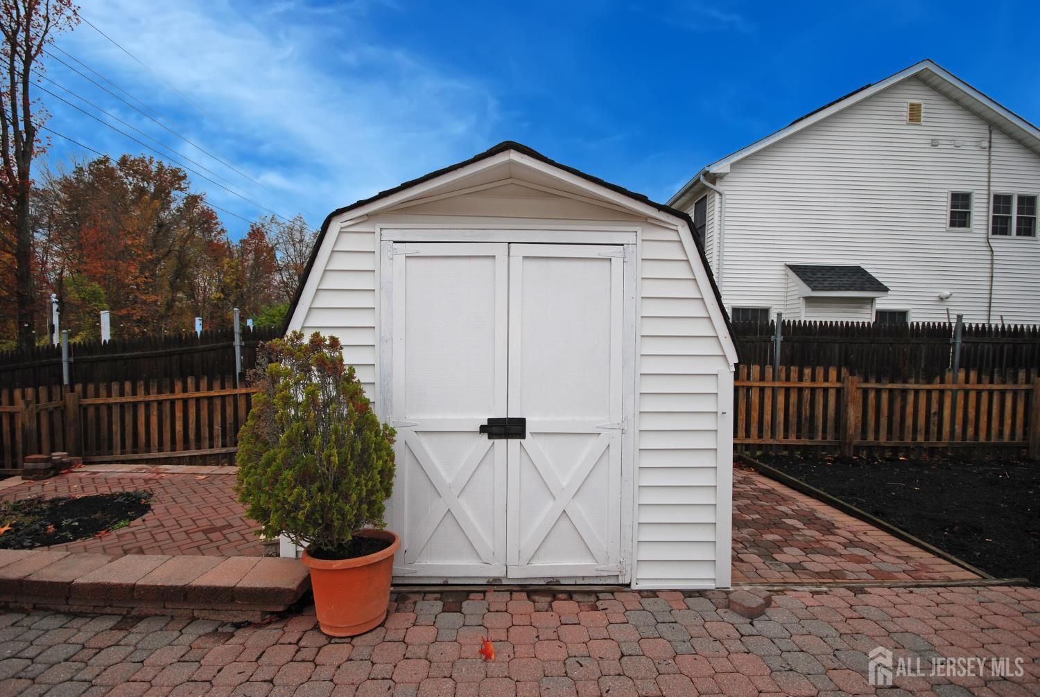 26 Sunshine Lane Edison, NJ 08820 - Photo 33 of 33 a front view of a house with a yard