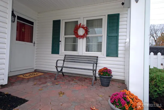 a view of entryway with flower pots