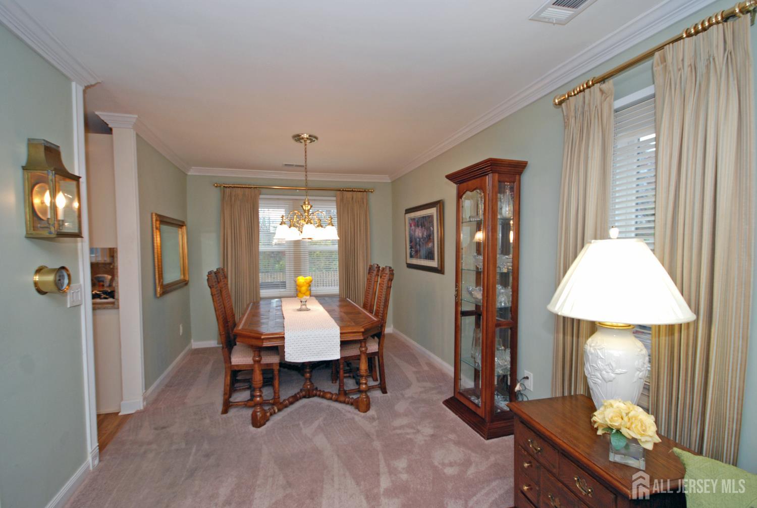 26 Sunshine Lane Edison, NJ 08820 - Photo 9 of 33 a view of a livingroom with furniture and a window