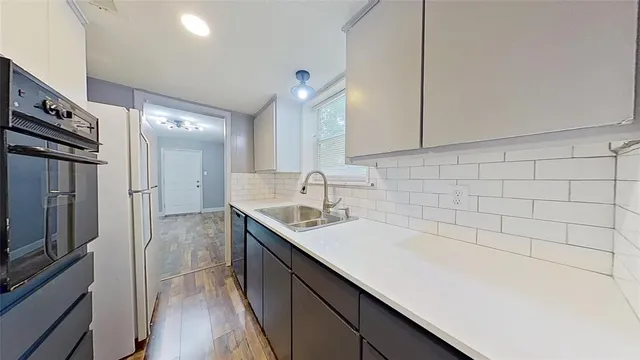 a bathroom with a sink a vanity and mirror