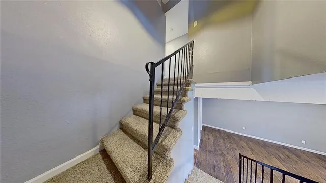 a view of entryway with stairs