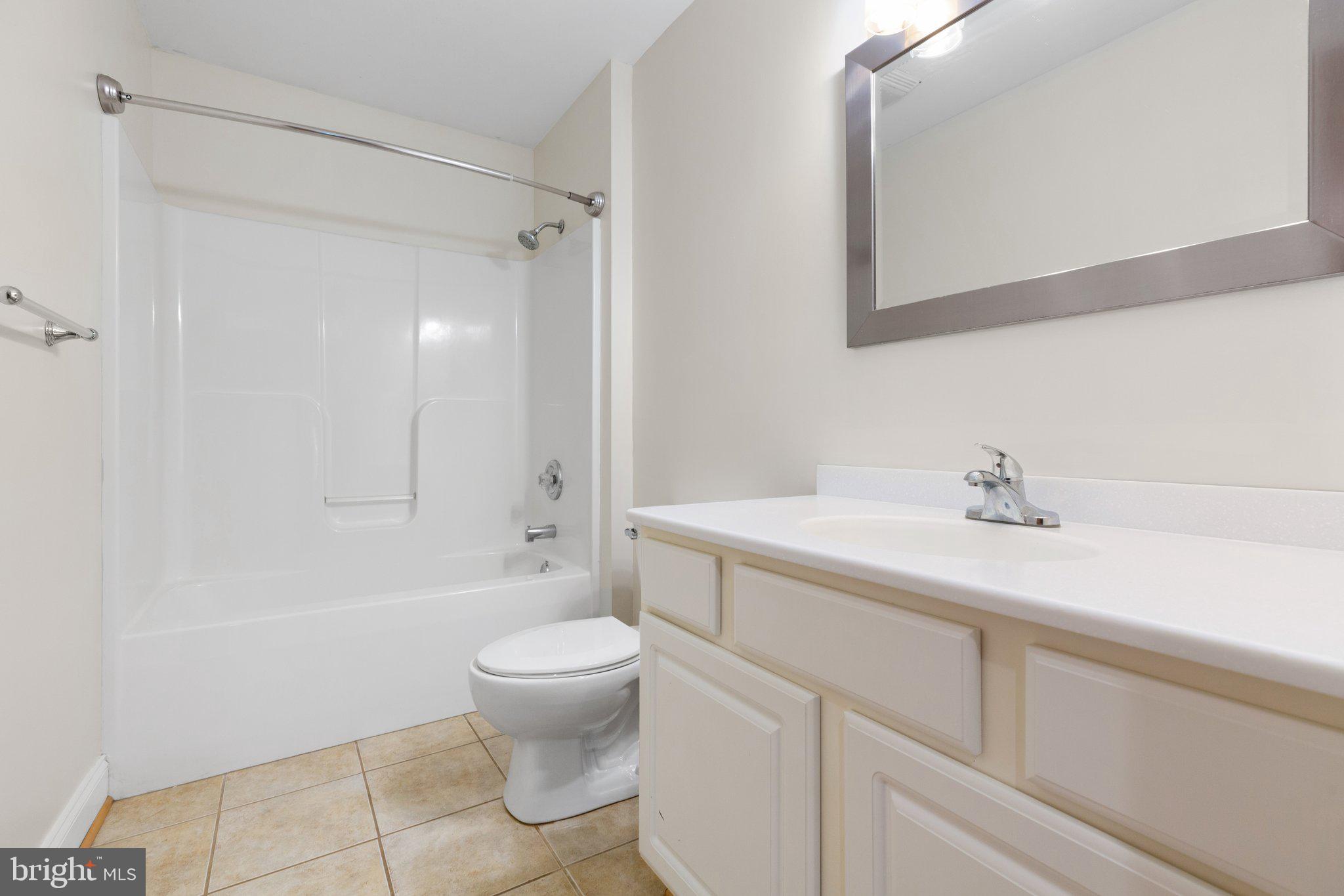 977 Fredericks Hall Road Bumpass, VA 23024 - Photo 23 of 38 Full bath in hall with tub/shower combo
