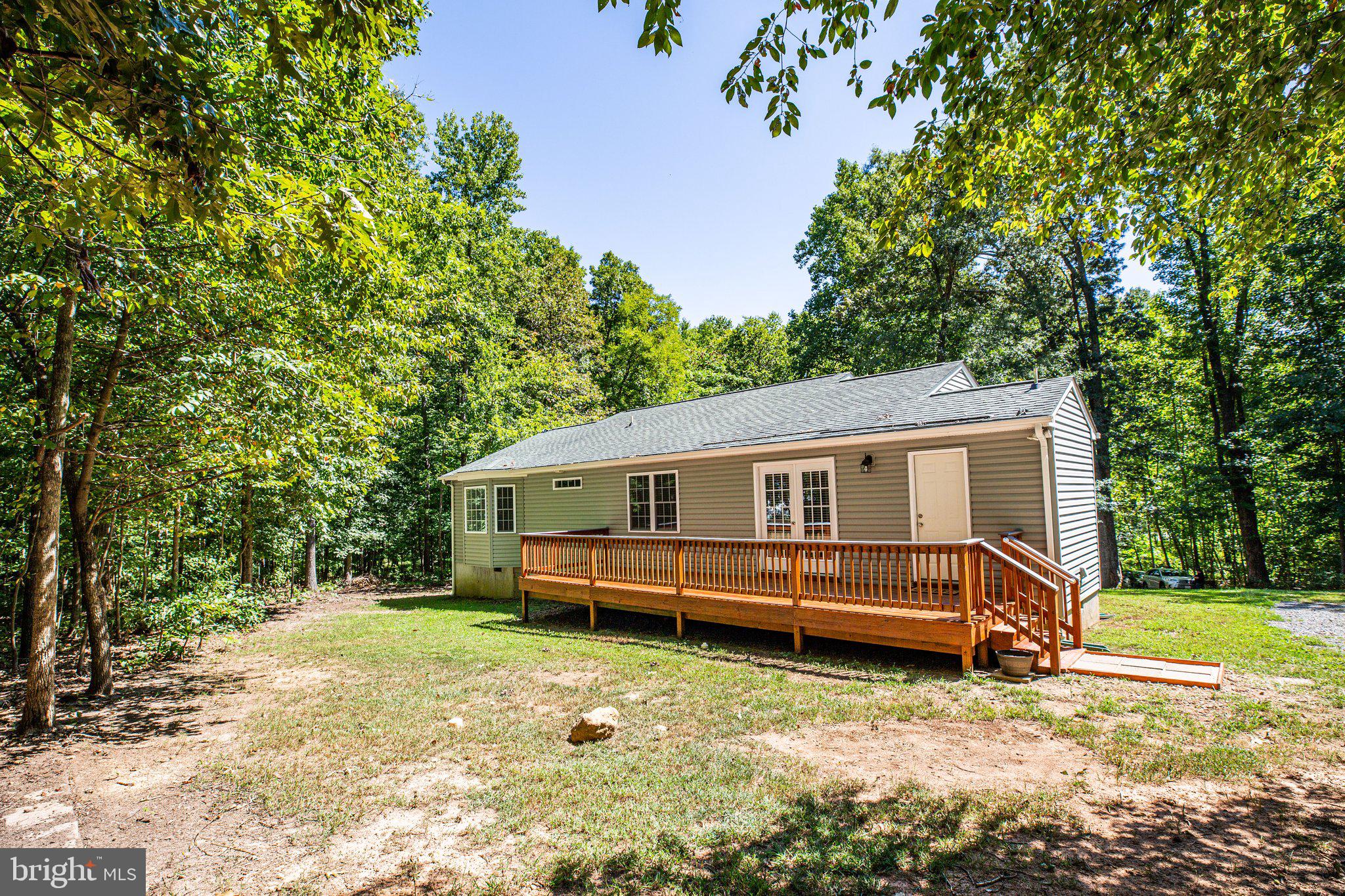 977 Fredericks Hall Road Bumpass, VA 23024 - Photo 29 of 38 Cleared back yard...make this space your own.