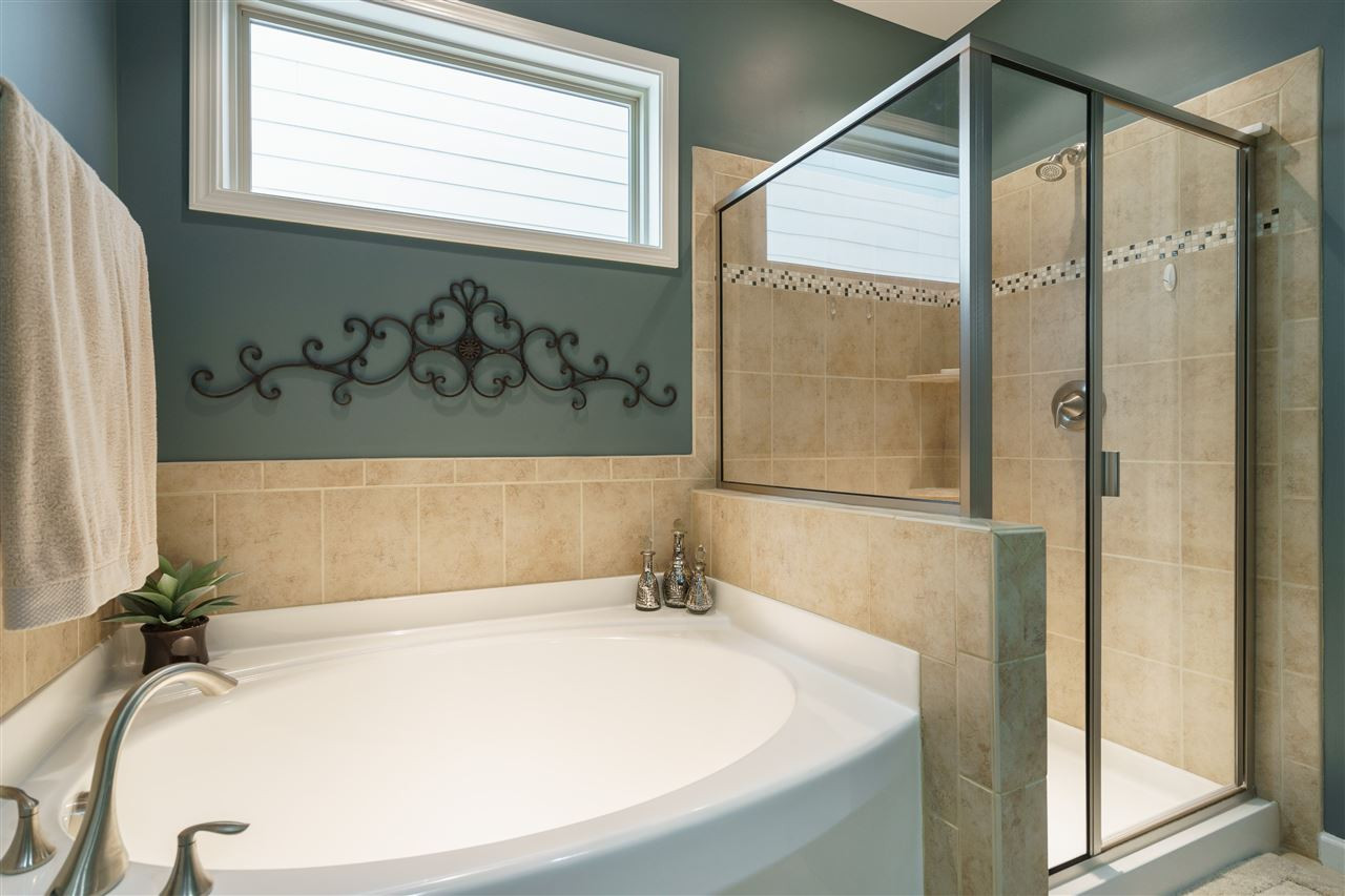 1533 Fullerton Place Raleigh, NC 27607 - Photo 15 of 25 MASTER BATHROOM CONNECTING TO MASTER BEDROOM WITH GARDEN TUB, SEPARATE SHOWER, DOUBLE SINKS AND CERAMIC TILE FLOOR. MASTER BATHROOM