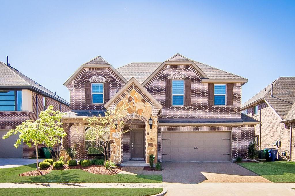 5012 Sugar Valley Road McKinney, TX 75070 - Photo 1 of 1 a front view of a house with a yard
