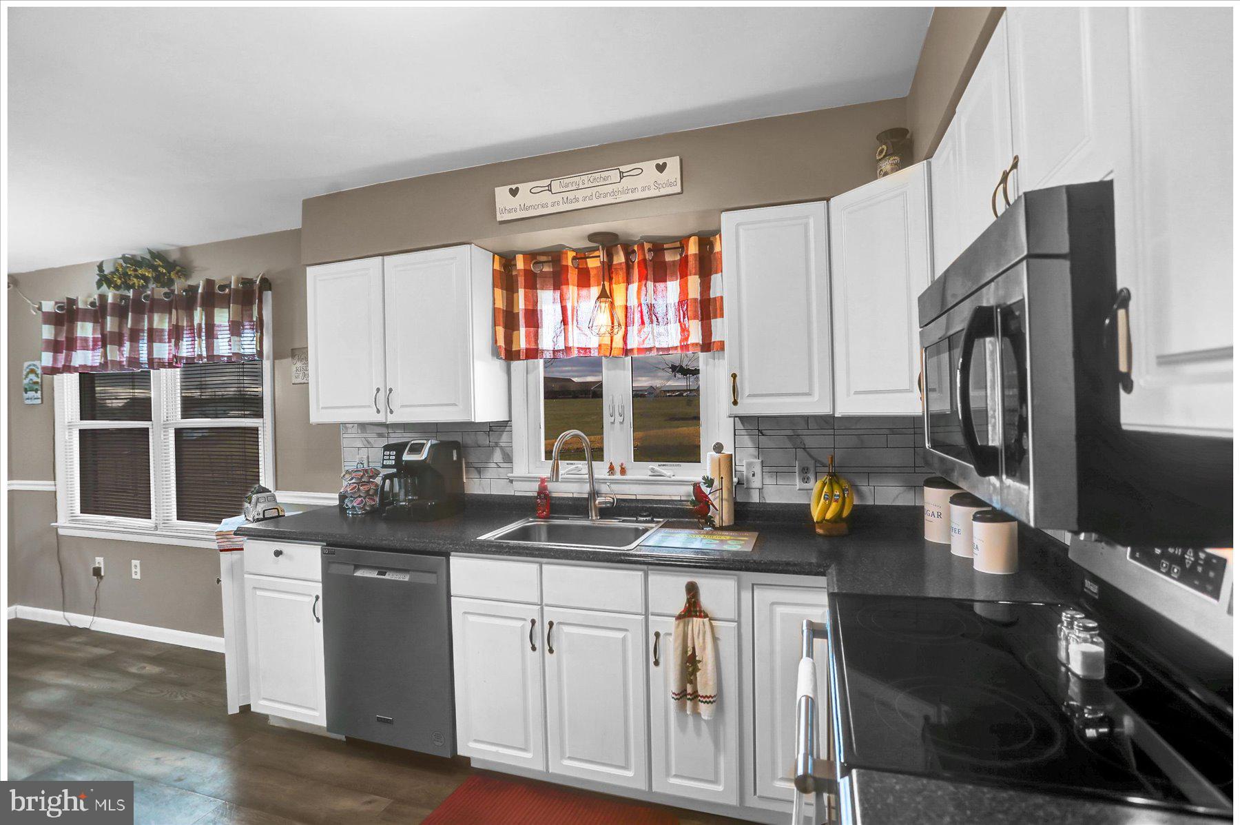 26 West Shortcut Road Newport, PA 17074 - Photo 11 of 37 a kitchen with a sink stove and microwave