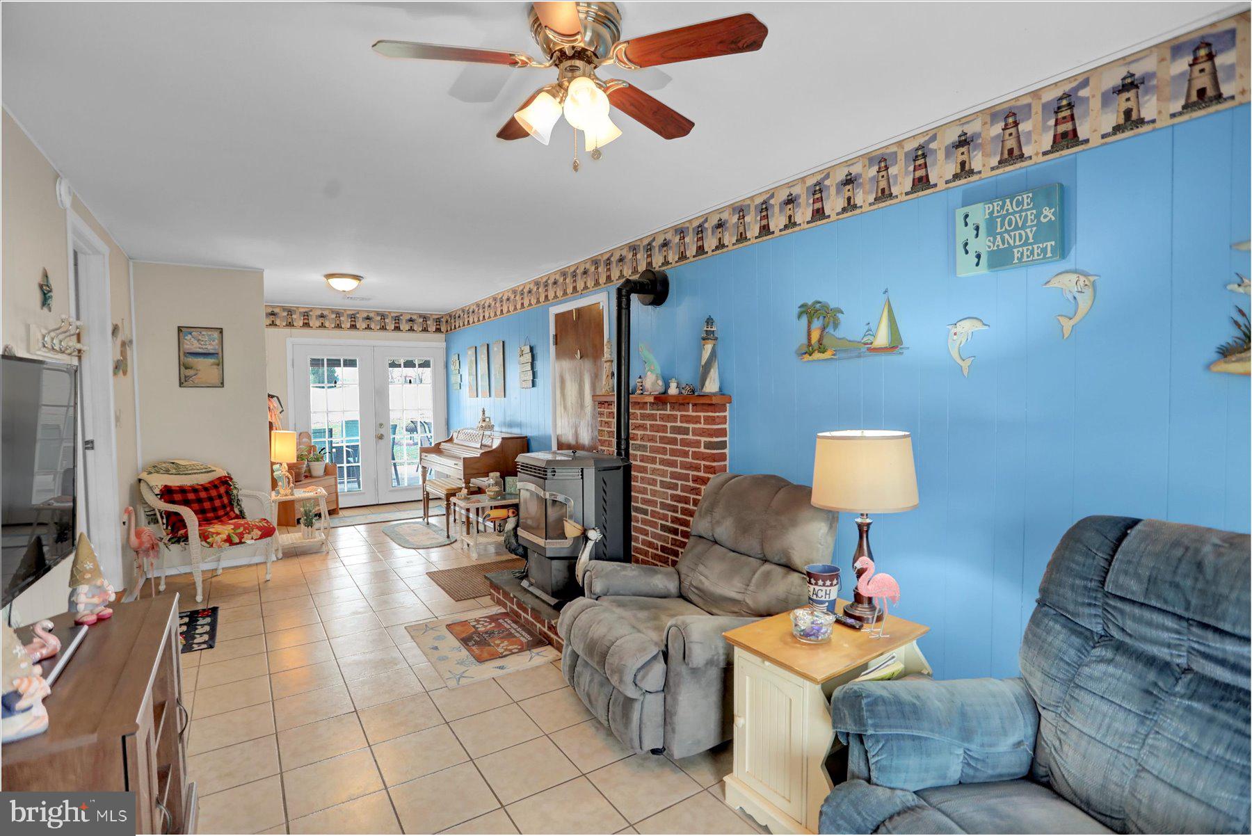 26 West Shortcut Road Newport, PA 17074 - Photo 25 of 37 a living room with furniture and a flat screen tv