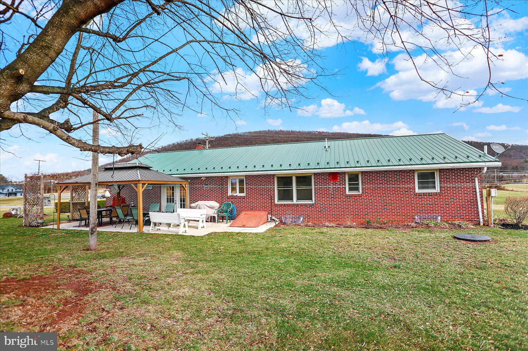26 West Shortcut Road Newport, PA 17074 - Photo 31 of 37 a front view of a house with a garden and trees