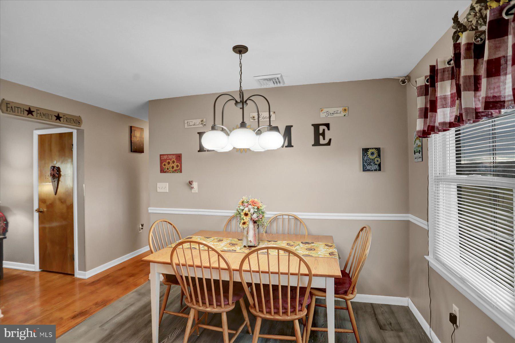 26 West Shortcut Road Newport, PA 17074 - Photo 7 of 37 a view of a dining room with furniture wooden floor and chandelier