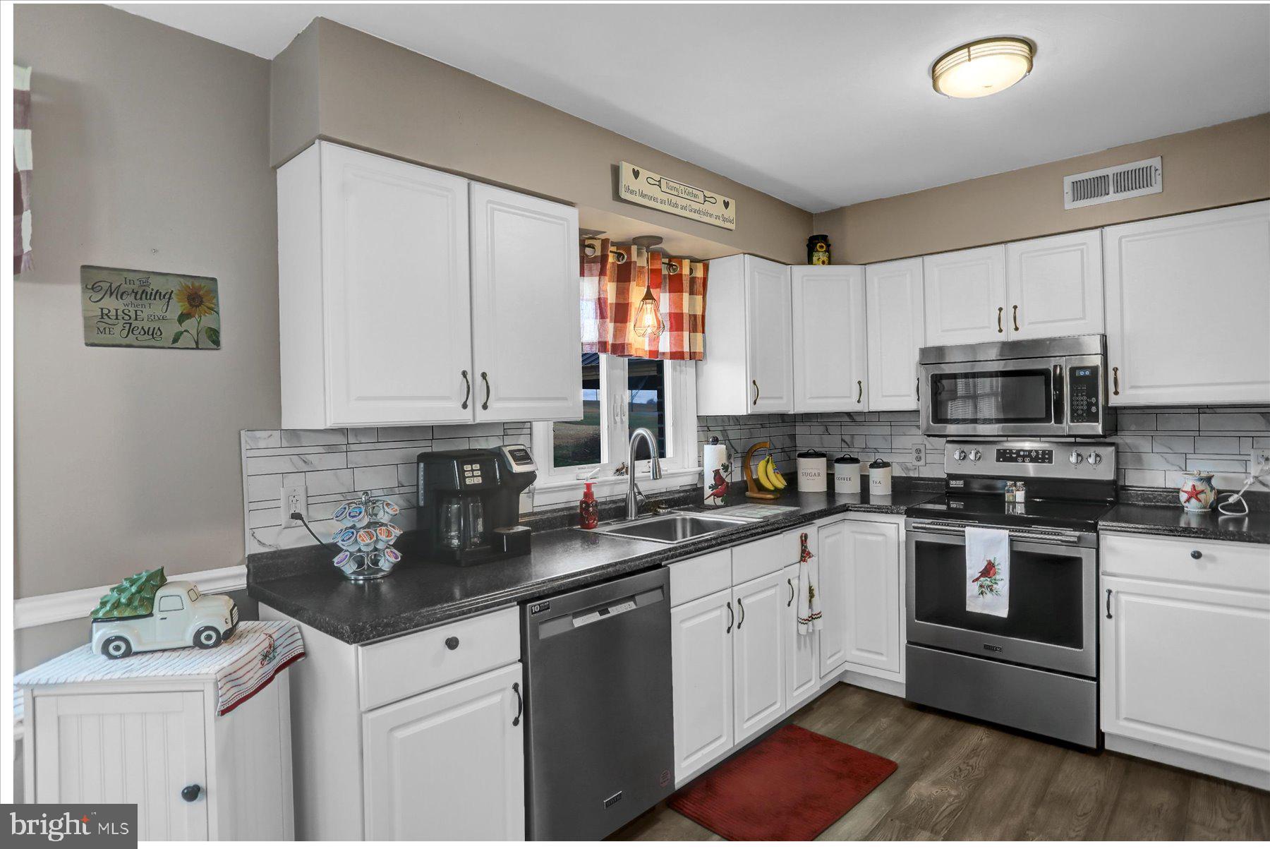 26 West Shortcut Road Newport, PA 17074 - Photo 10 of 37 a kitchen with granite countertop a sink stainless steel appliances and cabinets