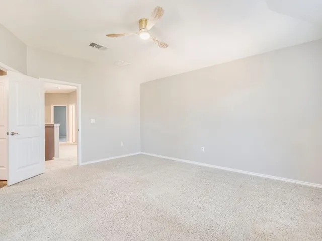 a bathroom with a double vanity sink toilet and shower