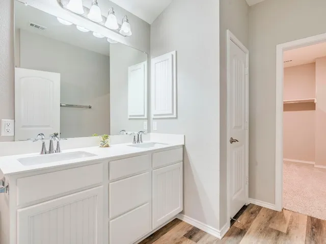 a view of an empty walk in closet