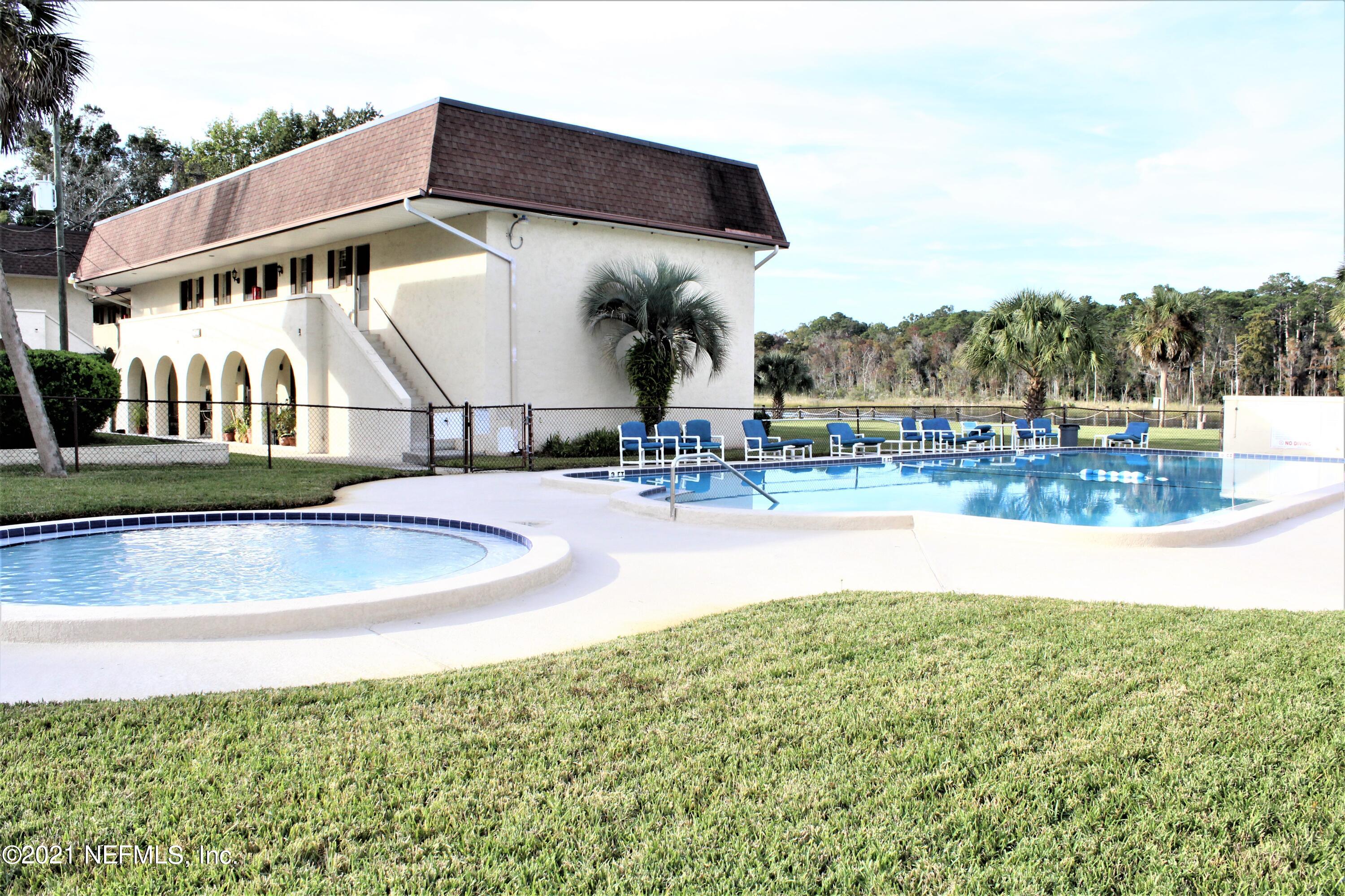 1557 El Prado Road, Unit 4 Jacksonville, FL 32216 - Photo 1 of 9 pool and lake_2(1)