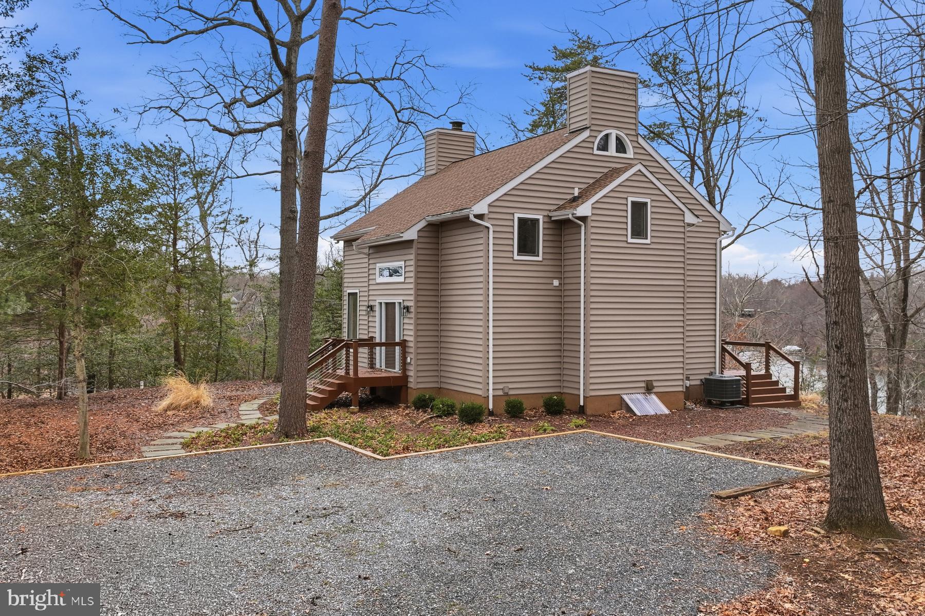 1717 Porters Hill Road Annapolis, MD 21401 - Photo 2 of 27 a view of a house with a yard covered with snow