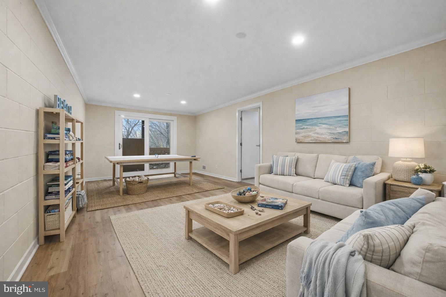 1717 Porters Hill Road Annapolis, MD 21401 - Photo 25 of 27 a living room with furniture and a table