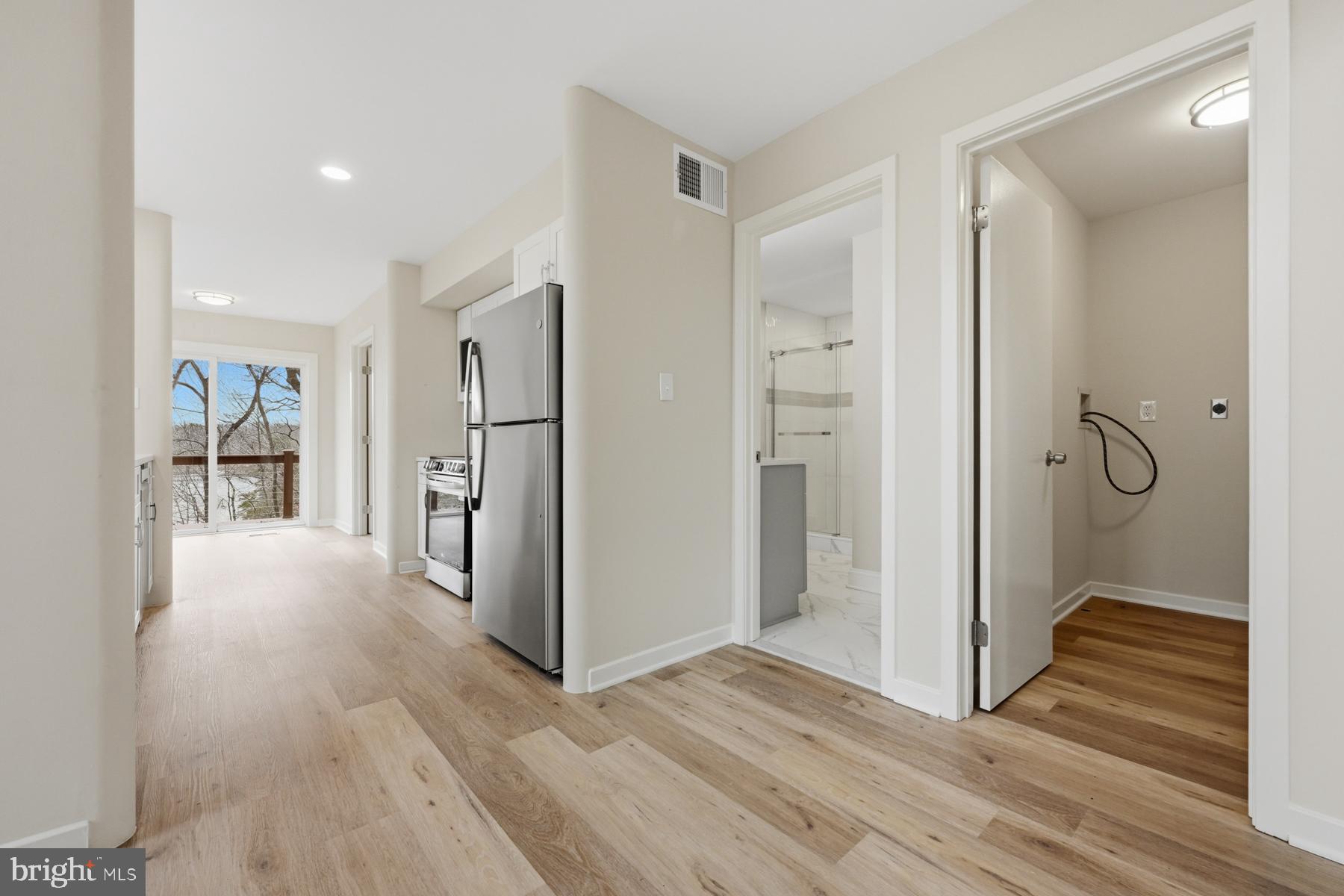 1717 Porters Hill Road Annapolis, MD 21401 - Photo 7 of 27 a view of a room with wooden floor and window
