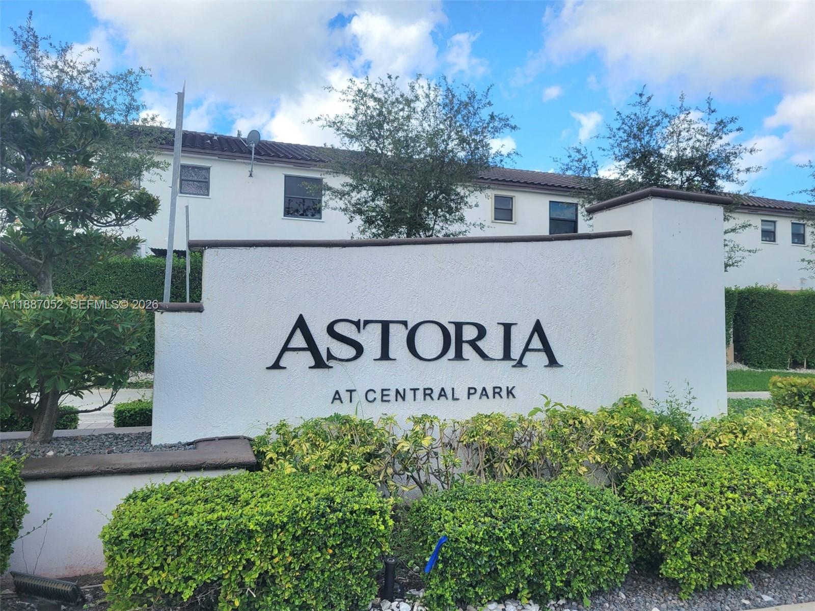 8860 Northwest 103rd Path Doral, FL 33178 - Photo 1 of 52 a sign broad on the wall