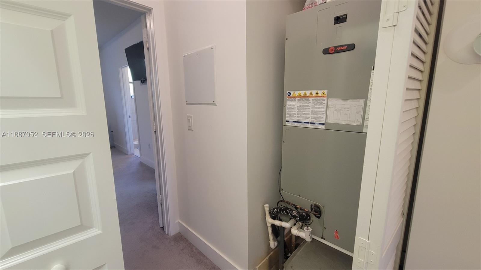 8860 Northwest 103rd Path Doral, FL 33178 - Photo 29 of 52 a view of a storage & utility room