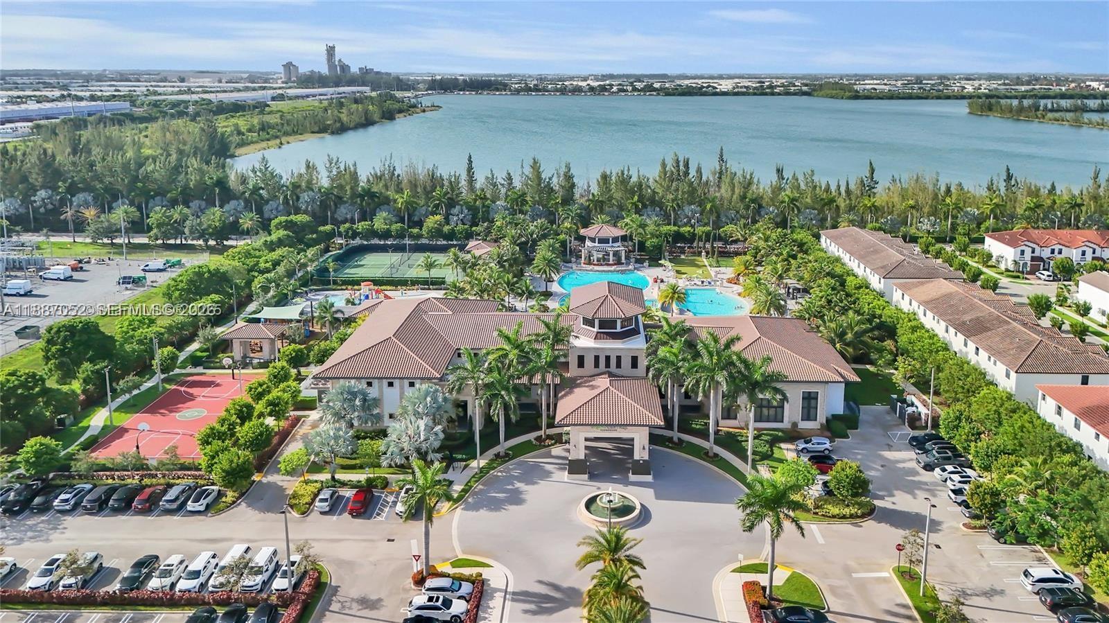 8860 Northwest 103rd Path Doral, FL 33178 - Photo 43 of 52 a view of lake and houses with outdoor space