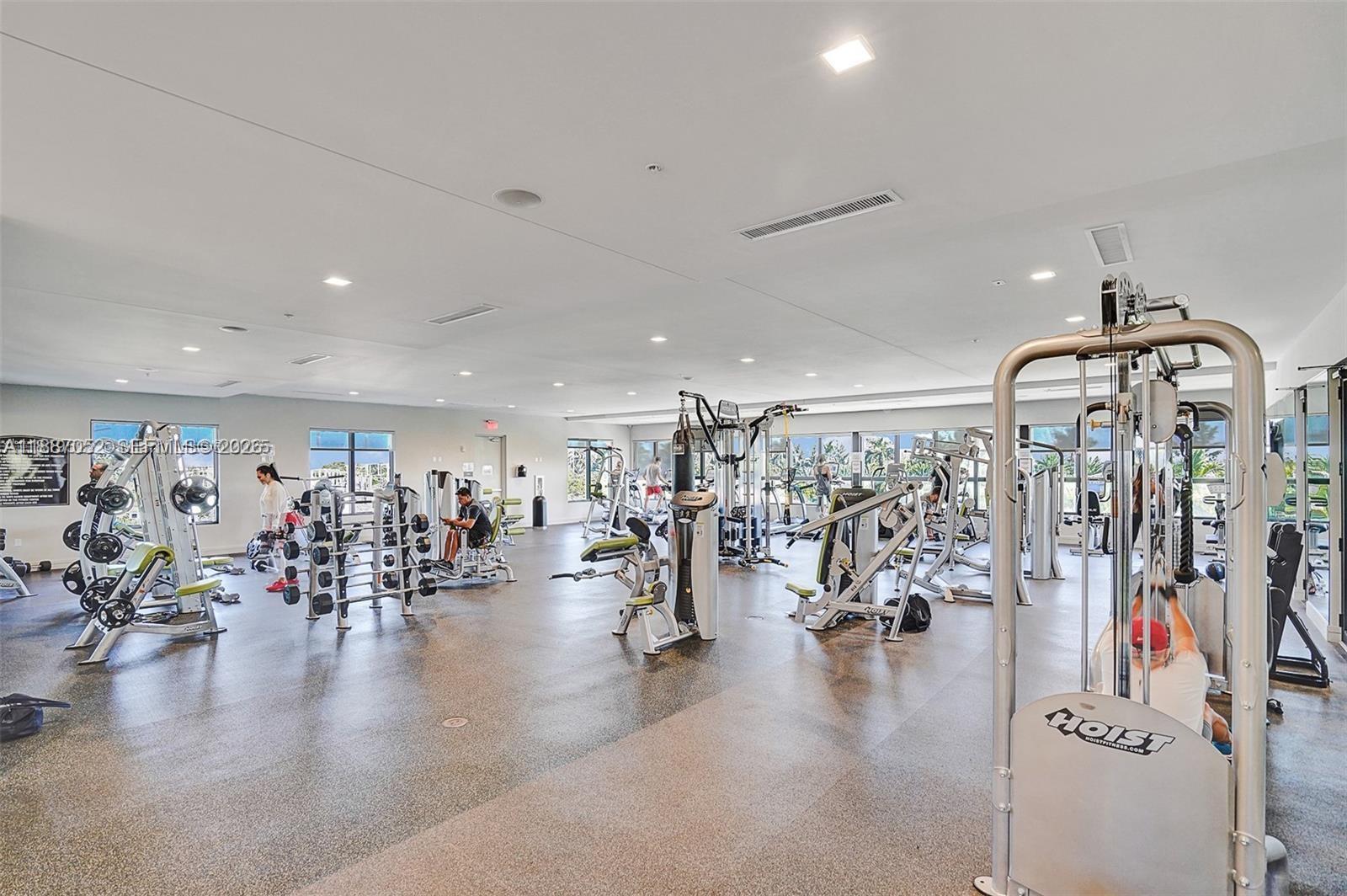 8860 Northwest 103rd Path Doral, FL 33178 - Photo 45 of 52 a view of a room with lots of gym equipment