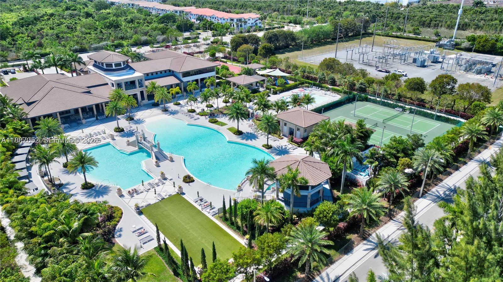 8860 Northwest 103rd Path Doral, FL 33178 - Photo 46 of 52 an aerial view of residential houses with outdoor space