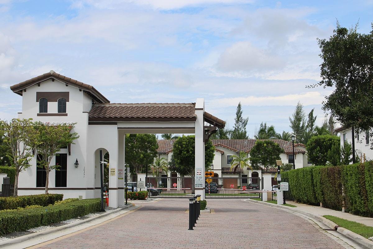 8860 Northwest 103rd Path Doral, FL 33178 - Photo 5 of 52 a view of a house with a porch