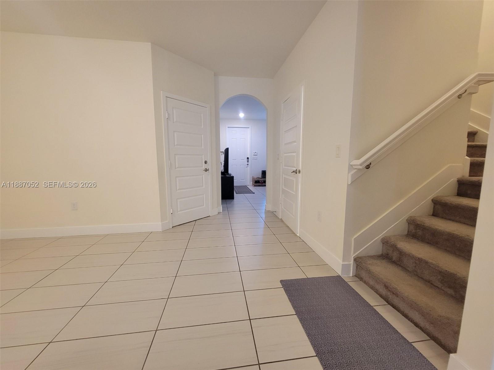 8860 Northwest 103rd Path Doral, FL 33178 - Photo 8 of 52 a view of entryway with a rug