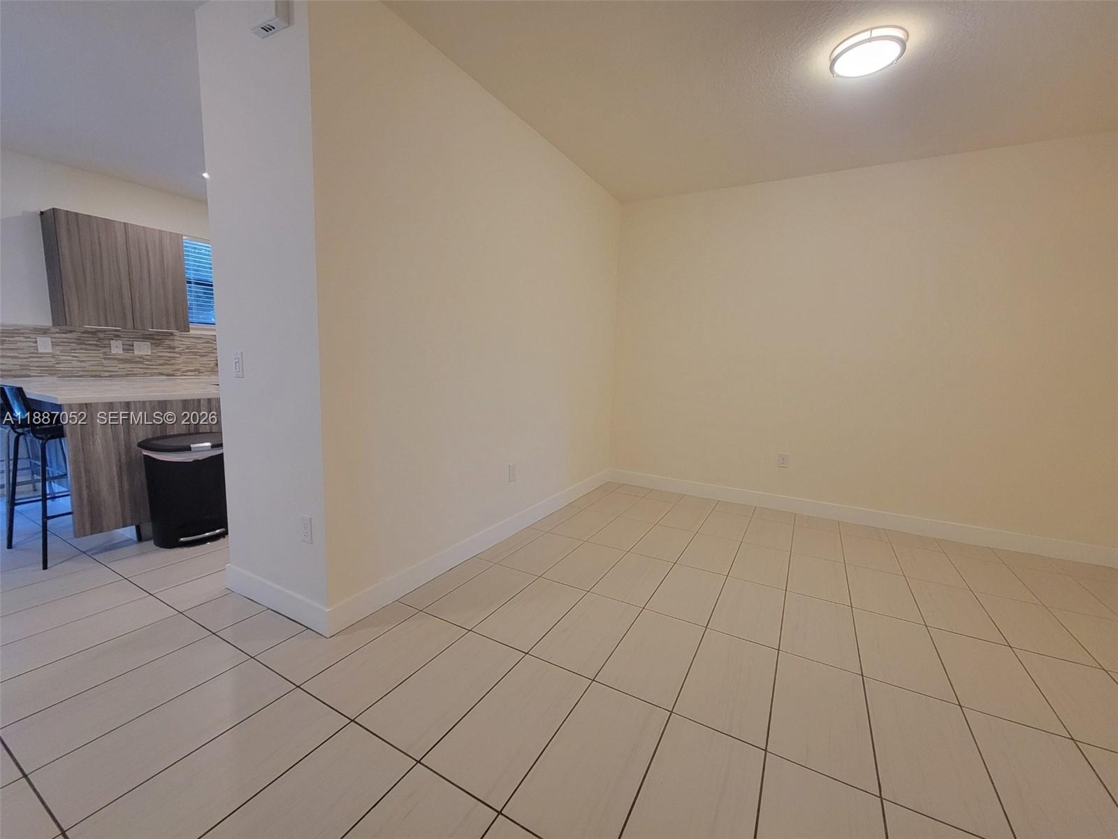 8860 Northwest 103rd Path Doral, FL 33178 - Photo 10 of 52 a view of an empty room with a sink
