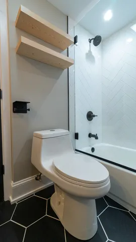 a view of staircase with wooden floor