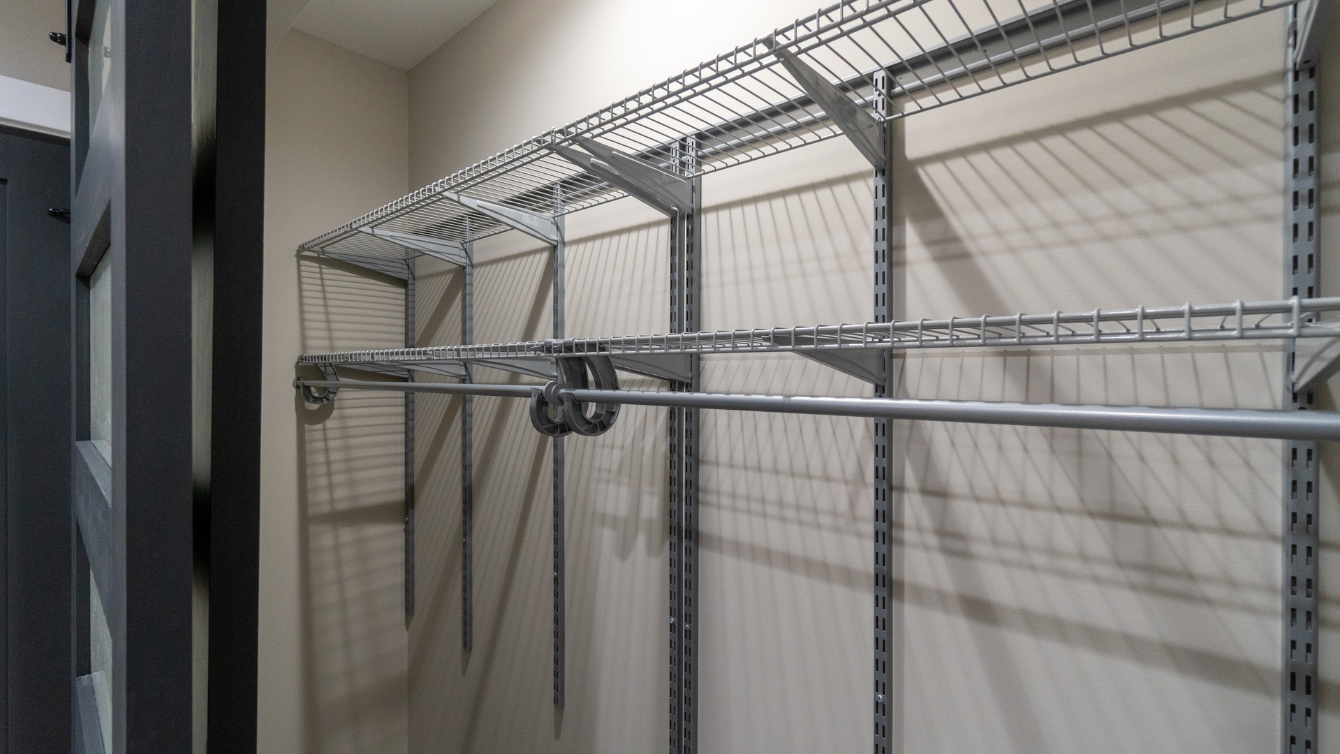 4745 North Beacon Street, Unit GS Chicago, IL 60640 - Photo 40 of 43 a view of a room with racks on the wall