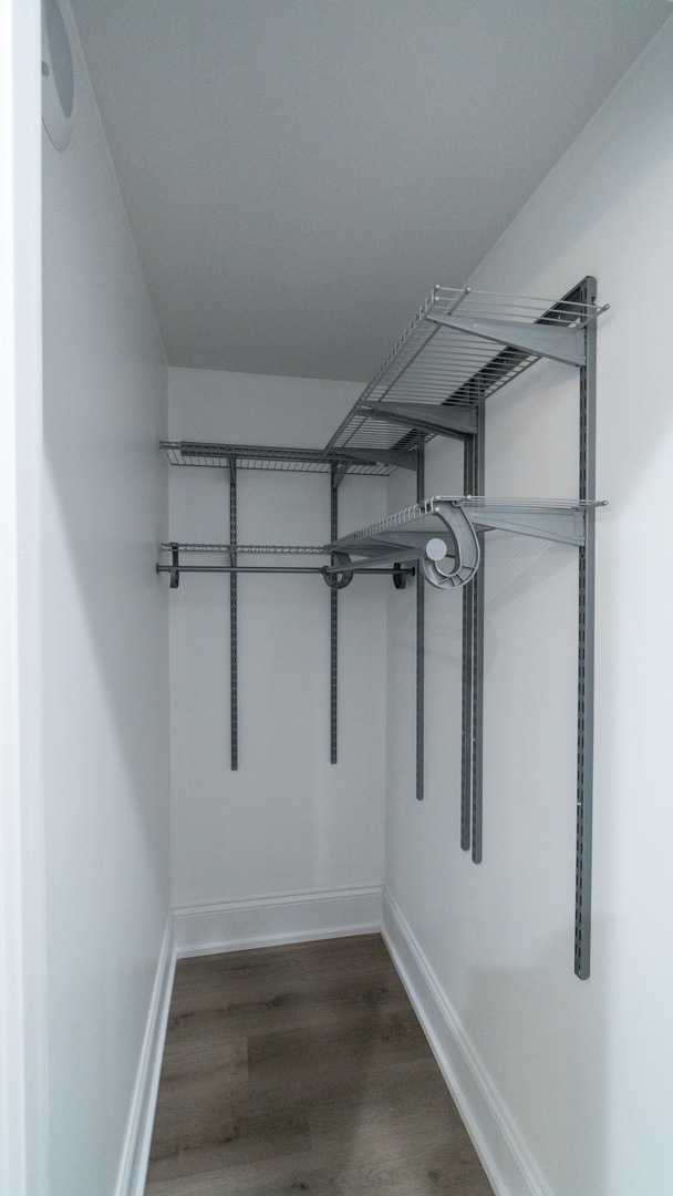 4745 North Beacon Street, Unit GS Chicago, IL 60640 - Photo 41 of 43 a view of a room with racks on the wall