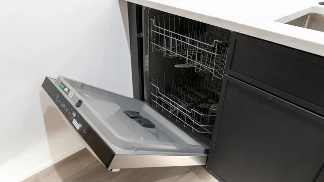 a kitchen with stainless steel appliances a stove a sink and dishwasher