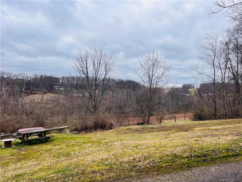 297 Oden Road Ruffs Dale, PA 15679 - Photo 5 of 24 a view of swimming pool with an outdoor space and seating area