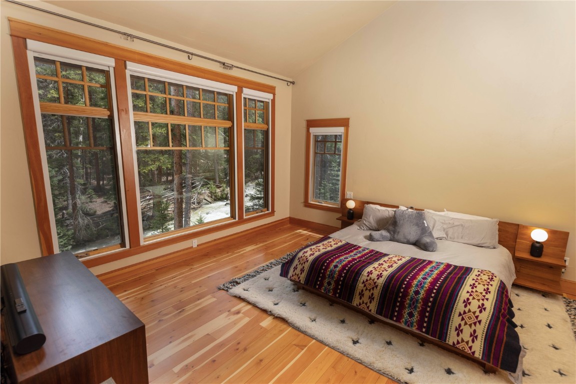 280 County Road 268 Keystone, CO 80435 - Photo 19 of 40 a bedroom with a large bed and a window