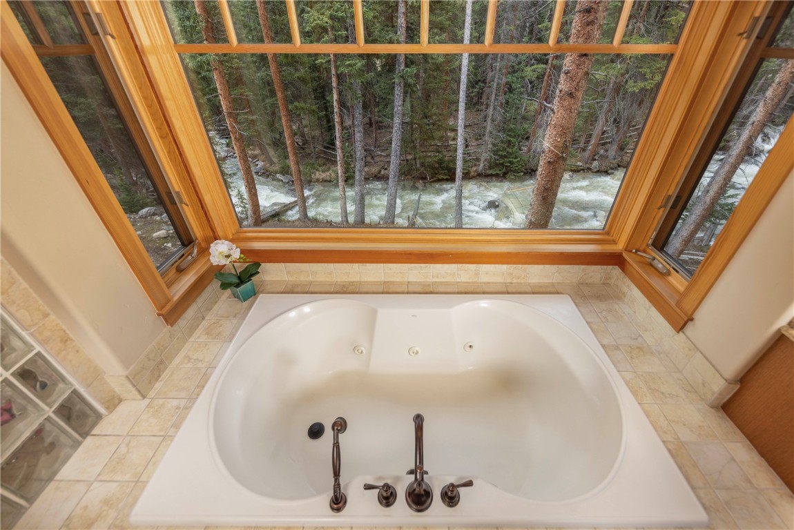 280 County Road 268 Keystone, CO 80435 - Photo 21 of 40 a bath tub sitting next to a window