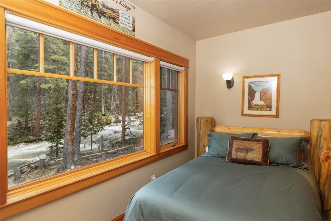 280 County Road 268 Keystone, CO 80435 - Photo 27 of 40 a bedroom with furniture and window