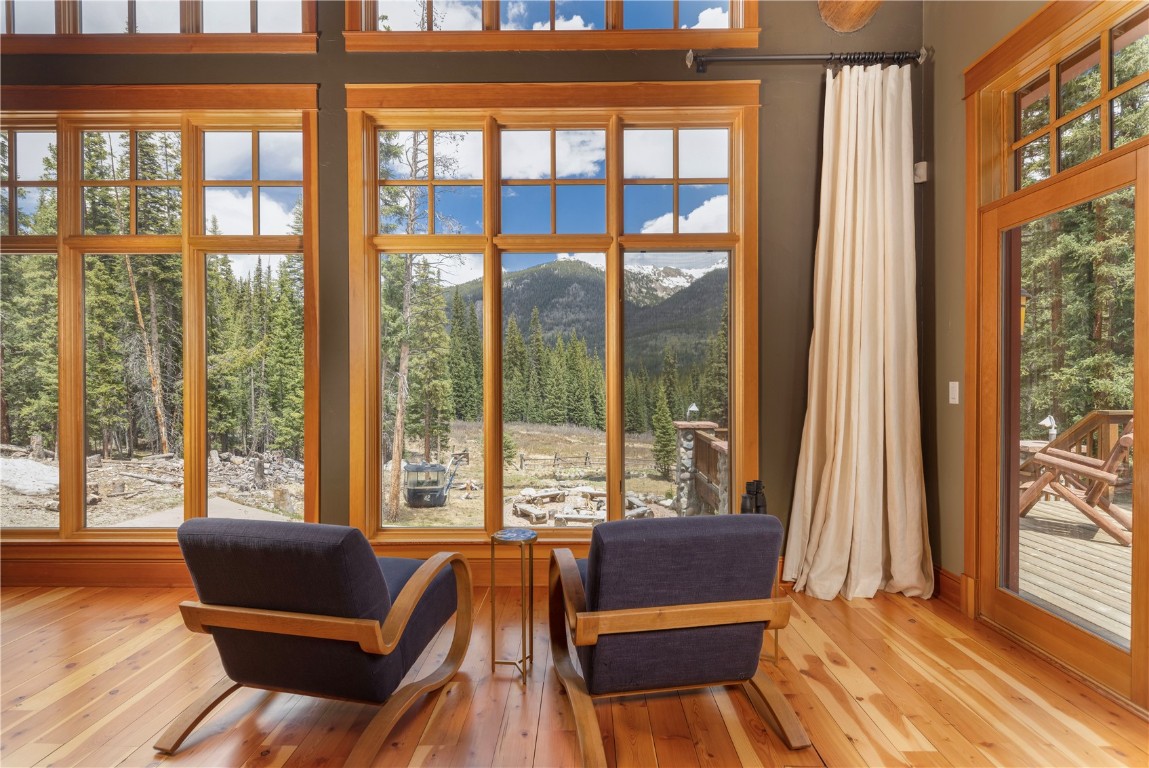 280 County Road 268 Keystone, CO 80435 - Photo 8 of 40 a living room with furniture and a floor to ceiling window