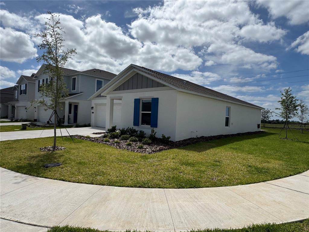 2405 Bluestone Road Haines City, FL 33844 - Photo 3 of 18 a view of a house with a yard