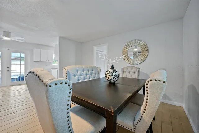 a view of kitchen and dining area with furniture